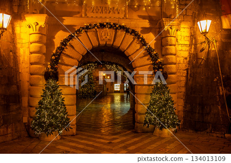 Old town Kotor archway decorated with Christmas trees Old town Kotor archway decorated with Christmas trees 134013109