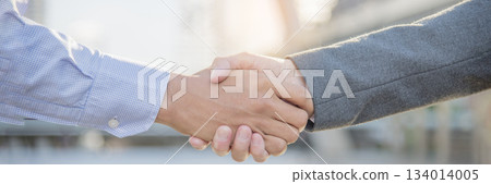 Banner Lawyer teamwork partnership Businessman handshake together. Panorama Two Men Trust honesty lawfirm business handshake promise respect partner. Diversity solidarity team Partner hands together Banner Lawyer teamwork partnership Businessman handshake together. Panorama Two Men Trust honesty lawfirm business handshake promise respect partner. Diversity solidarity team Partner hands together 134014005