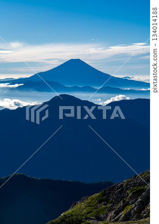 Mount Fuji seen at sunrise from the summit of Mount Akaishi. Climbing Mount Akaishi in the Southern Alps 134014188