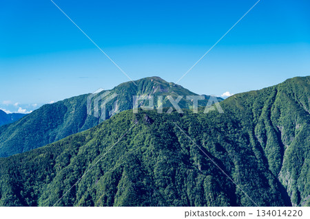 Mount Kamikawachi seen from Fujimi-daira on the Okura Ridge. Climbing Mount Akaishi in the Southern Alps. Mount Kamikawachi seen from Fujimi-daira on the Okura Ridge. Climbing Mount Akaishi in the Southern Alps. 134014220