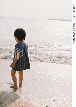 little girl at beach little girl at beach 134016874