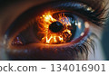 hot eye reflection close up, fire in iris 134016901