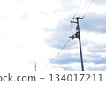Cloudy sky and electric pole 134017211