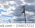 Cloudy sky and electric pole 134017212