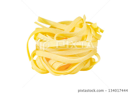 one raw tagliatelle nest, isolated on white background with clipping path 134017444