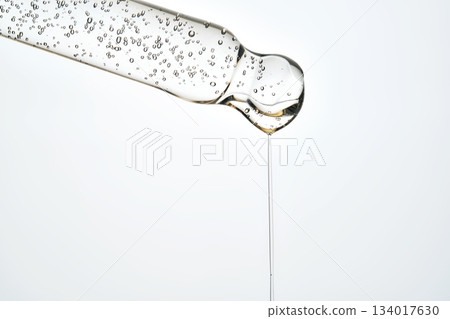 Pipette dripping cosmetic serum for skincare beauty 134017630