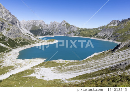 Lunersee artificial lake view in Ratikon Alps during a clear day in Vorarlberg Austria Lunersee artificial lake view in Ratikon Alps during a clear day in Vorarlberg Austria 134018243