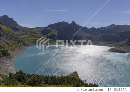 Lunersee artificial lake in Ratikon Alps, Vorarlberg, Austria during sunny weather Lunersee artificial lake in Ratikon Alps, Vorarlberg, Austria during sunny weather 134018251