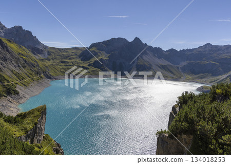 Lunersee artificial lake in Ratikon Alps, Vorarlberg, Austria during sunny weather Lunersee artificial lake in Ratikon Alps, Vorarlberg, Austria during sunny weather 134018253