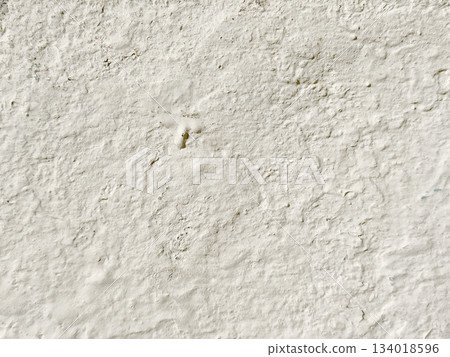 Light stone wall texture as background with copy space, Trendy color 2026 year Cloud Dancer 134018596