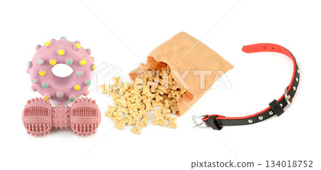 Assortment of Pet Dog Toys, Treats, and Collar Isolated on White Assortment of Pet Dog Toys, Treats, and Collar Isolated on White 134018752
