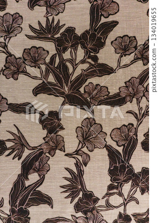 Light Linen Fabric Texture Close-Up with Brown Vintage Floral Motif 134019655