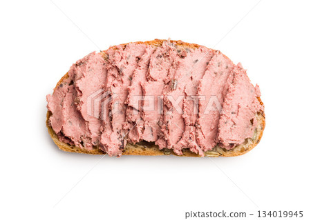Pate on a slice of bread isolated on white background. Pate on a slice of bread isolated on white background. 134019945