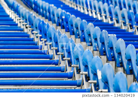 metal luggage trolleys close-up at airport, selective focus 134020419