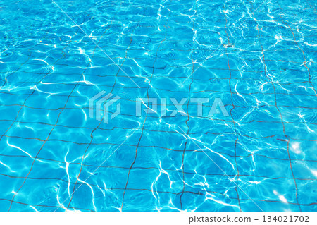 Bright blue swimming pool water texture 134021702