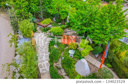 Drone view OF SMALL JAPANESE GARDEN IN Botanical garden of Tbilisi Drone view OF SMALL JAPANESE GARDEN IN Botanical garden of Tbilisi 134023529