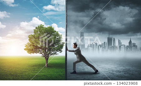 Conceptual cloud wonder shows a man pushing boundaries between nature and urban landscape during daytime 134023908