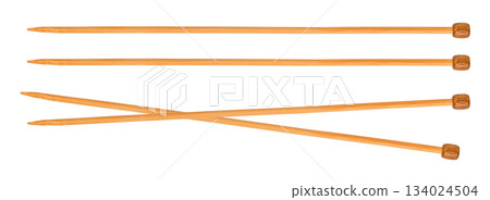 wooden knitting needles, lie crossed. Isolated on white background 134024504