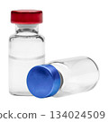 Simple glass vial with a metal cap filled with a clear liquid 134024509