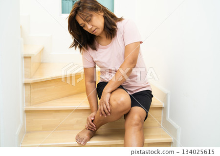 Asian lady woman patient fall down the stairs because slippery surfaces. 134025615