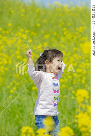 Girls playing in rape fields 134025812
