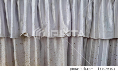 Layered White Fabric Ruffles and Dirty Curtain Close-Up Texture Layered White Fabric Ruffles and Dirty Curtain Close-Up Texture 134026303