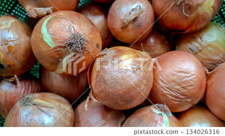 Abundant Fresh Brown and Yellow Onions Full Frame Background Abundant Fresh Brown and Yellow Onions Full Frame Background 134026316