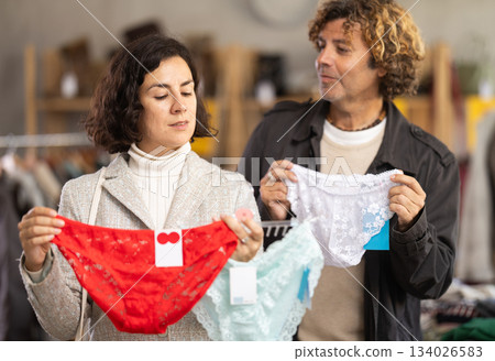 Couple choosing panties in the store 134026583