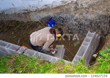 Grinding stones with an angle grinder 134027158