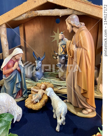 A model of the stable in Bethlehem depicting the birth of Jesus on Christmas Eve, a symbol of Christmas | Christmas and seasonal event materials A model of the stable in Bethlehem depicting the birth of Jesus on Christmas Eve, a symbol of Christmas | Christmas and seasonal event materials 134027172