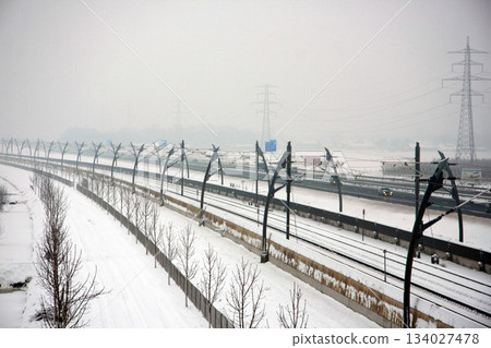 Traffic on the railroads in Tiel has to deal with bad weather. Traffic on the railroads in Tiel has to deal with bad weather. 134027478