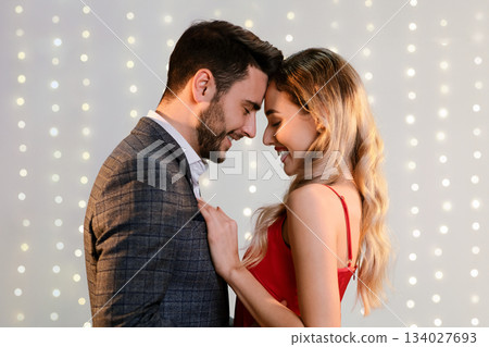 You're My Everything. Portrait of young couple in love bonding, touching foreheads and smiling, celebrating Valentine's Day together, closeup You're My Everything. Portrait of young couple in love bonding, touching foreheads and smiling, celebrating Valentine's Day together, closeup 134027693