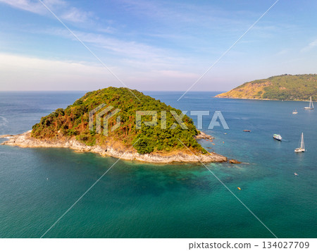 Top view seashore waves nature background,Amazing waves crashing on rocks seascape view 134027709