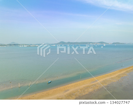 Aerial top view beach sea waves surface nature background Aerial top view beach sea waves surface nature background 134027747
