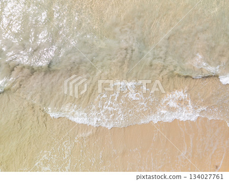 Aerial top view beach sea waves surface nature background 134027761