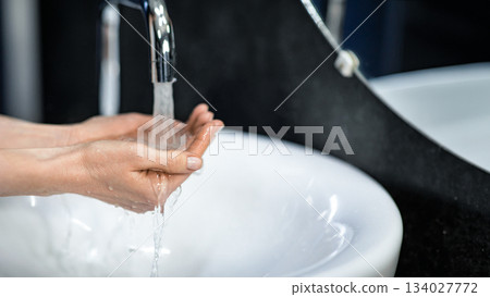 Healthy Handwashing. Unrecognizable Woman Washing Hands For Infection Control During Pandemic In Bathroom Indoor. Closeup, Cropped Healthy Handwashing. Unrecognizable Woman Washing Hands For Infection Control During Pandemic In Bathroom Indoor. Closeup, Cropped 134027772
