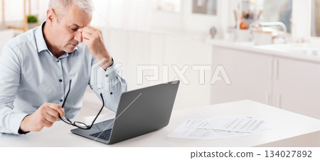 Thinking About Problems. Fatigued senior businessman massaging nosebridge with closed eyes, free space 134027892
