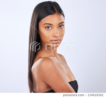 Indian woman, hair care or face in studio portrait for beauty, healthy natural shine or wellness. Beautiful glowing young girl model, self love or salon cosmetics in grooming on white background Indian woman, hair care or face in studio portrait for beauty, healthy natural shine or wellness. Beautiful glowing young girl model, self love or salon cosmetics in grooming on white background 134028382