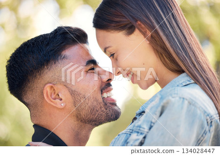 Face, smile and a couple in the garden together, feeling happy while dating for romance in summer. Love, park or spring with a man and woman bonding outside in nature as a romantic partnership Face, smile and a couple in the garden together, feeling happy while dating for romance in summer. Love, park or spring with a man and woman bonding outside in nature as a romantic partnership 134028447