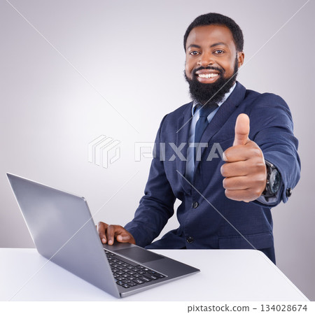Black man, laptop and thumbs up isolated on a white background portrait for winning, online success and thank you. Happy business person or winner with yes, like and vote sign on computer in studio Black man, laptop and thumbs up isolated on a white background portrait for winning, online success and thank you. Happy business person or winner with yes, like and vote sign on computer in studio 134028674