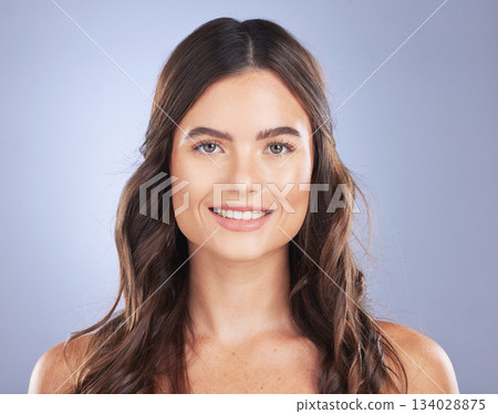 Woman, beauty and hair care portrait or smile in studio for texture, growth and shine on blue background. Aesthetic female happy for haircare, skincare and natural cosmetics for salon or hairdresser Woman, beauty and hair care portrait or smile in studio for texture, growth and shine on blue background. Aesthetic female happy for haircare, skincare and natural cosmetics for salon or hairdresser 134028875