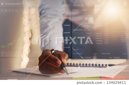 Businessman, hands and writing at night on stock market analysis, finance or cryptocurrency on office desk. Hand of man in financial trading analytics or investing working late with dashboard overlay Businessman, hands and writing at night on stock market analysis, finance or cryptocurrency on office desk. Hand of man in financial trading analytics or investing working late with dashboard overlay 134029411