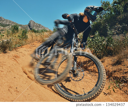 Cycling, fast and extreme sports with man on mountain bike for adventure, fitness and adrenaline junkie. Exercise, risk and motion blur with male athlete in nature for workout, training and speed Cycling, fast and extreme sports with man on mountain bike for adventure, fitness and adrenaline junkie. Exercise, risk and motion blur with male athlete in nature for workout, training and speed 134029437