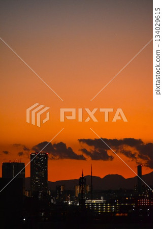 The beautifully colored sunset clouds change shape every moment 134029615