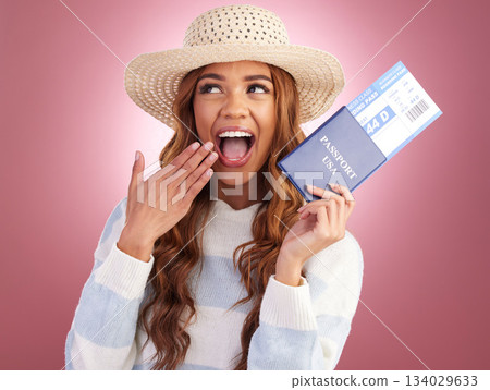 Travel, passport and woman is excited, smile and plane ticket with freedom on pink background. American female, carefree and happiness, traveling documents and vacation, ready for journey in studio 134029633