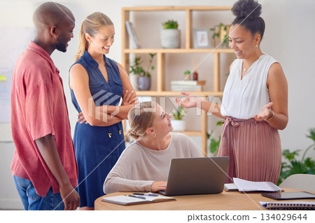 Business people, startup meeting and woman with laptop in office with planning, question or teamwork. Group, diversity and support for black man, women or happiness for proposal, solution or strategy 134029644
