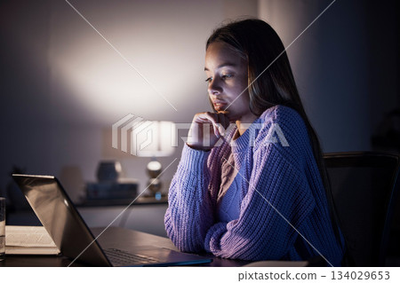 Remote work laptop, thinking and night woman contemplating university studying research, college project or home idea. Education learning focus, problem solving study and female student reading data 134029653