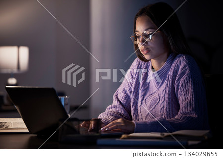 Home laptop, typing and night woman, student or girl working on remote work, research project or late studying. Education, learning study and person review online report, knowledge data and focus Home laptop, typing and night woman, student or girl working on remote work, research project or late studying. Education, learning study and person review online report, knowledge data and focus 134029655