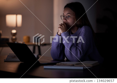 Home laptop, thinking and night woman contemplating university studying research, college project or essay idea. Education learning, knowledge study and female student problem solving report crisis Home laptop, thinking and night woman contemplating university studying research, college project or essay idea. Education learning, knowledge study and female student problem solving report crisis 134029657