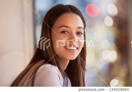 Portrait, happy and a woman in a coffee shop, sitting by the window to relax alone over the weekend. Face, smile and cafe with an attractive young female customer waiting for service in a restaurant Portrait, happy and a woman in a coffee shop, sitting by the window to relax alone over the weekend. Face, smile and cafe with an attractive young female customer waiting for service in a restaurant 134029664